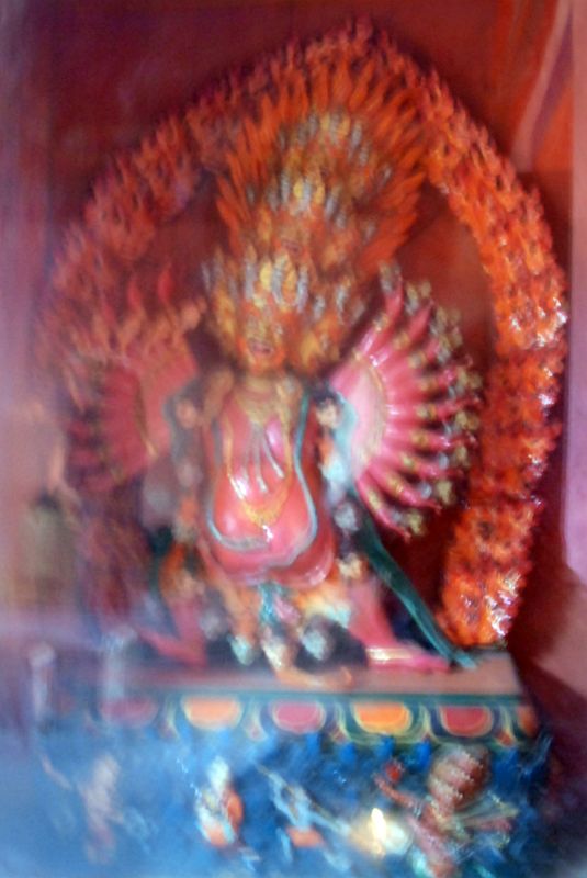 15 Inside Chuku Nyenri Gompa Wrathful Statue On Mount Kailash Outer Kora The Chuku (Nyenri) Gompa has several statues, including a many-armed, many-headed wrathful figure.